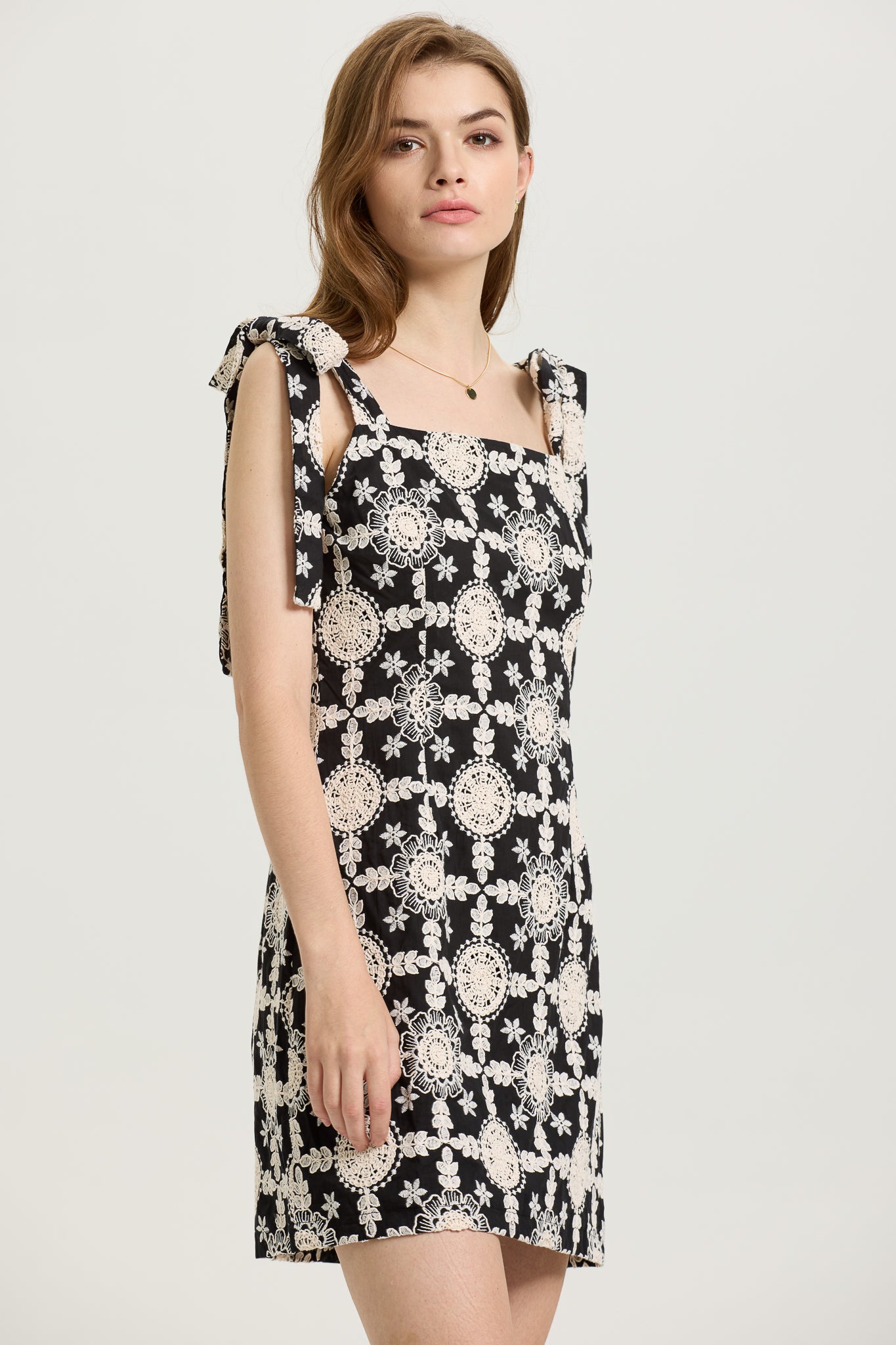 RP2592 - Lace Overlay Black Mini Dress with Bow-Tie Straps (2S-2M-2L)